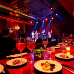 Dinner SXM experience at Club Noir with vibrant atmosphere and elegant dining.