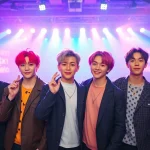 Dynamic performance of BTS members showcasing their vibrant energy and unity.